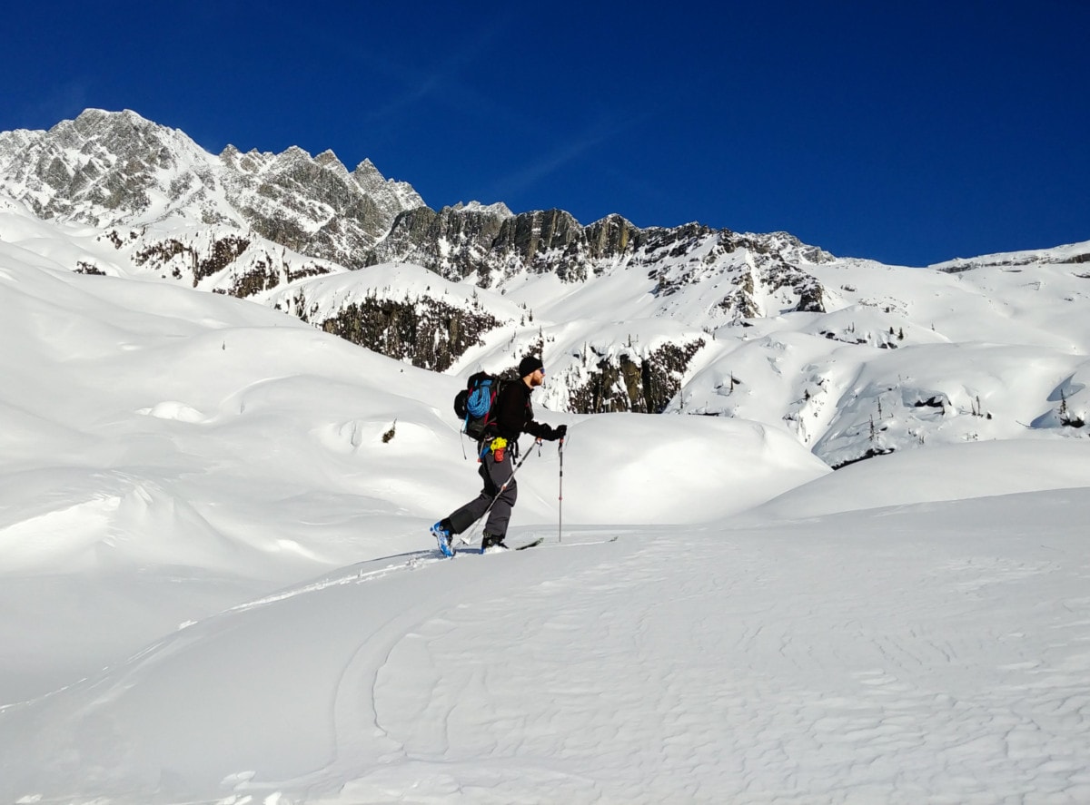 ski mountaineer heading up swiss glacier