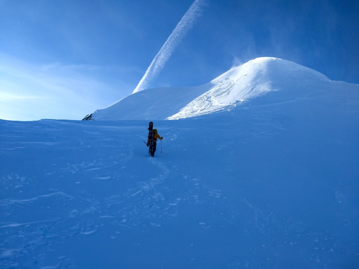 splitboarder on the final stretch to rogers peak