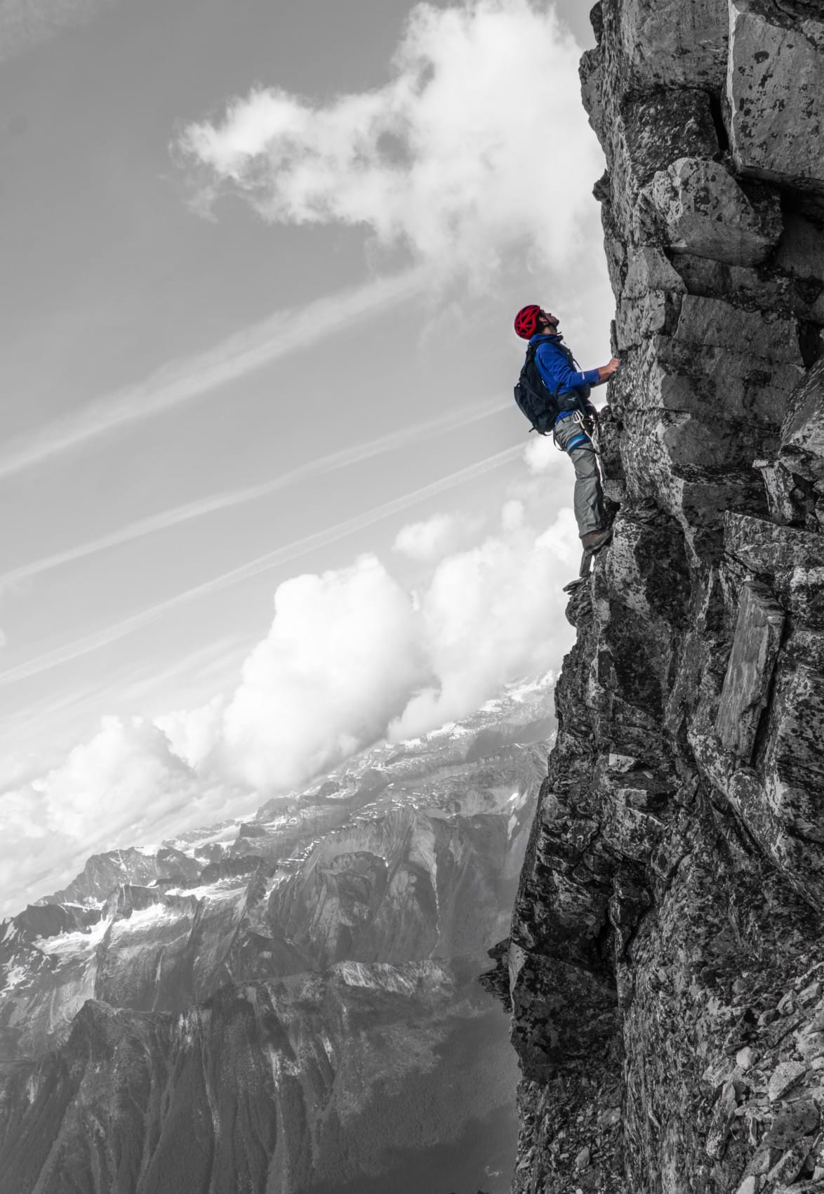 man rock climbing up rogers ridge