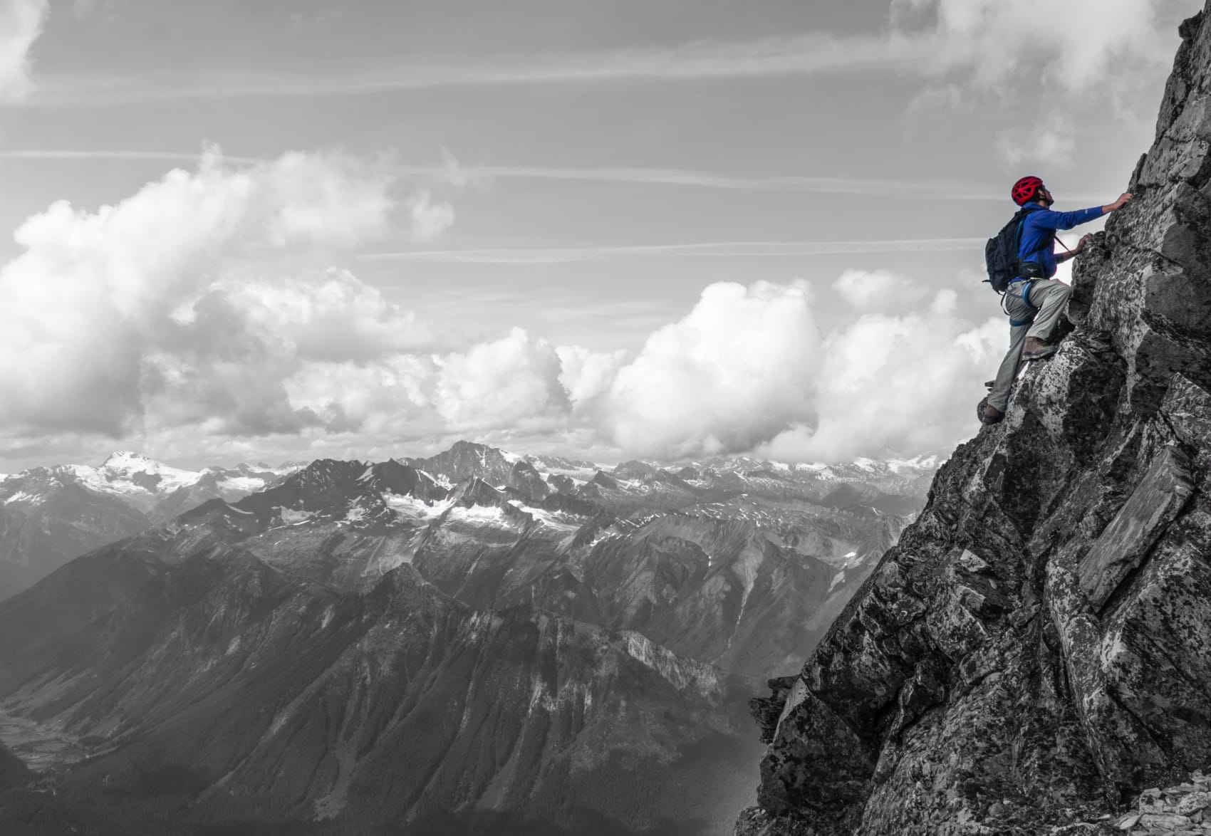 man rock climbing up rogers peak