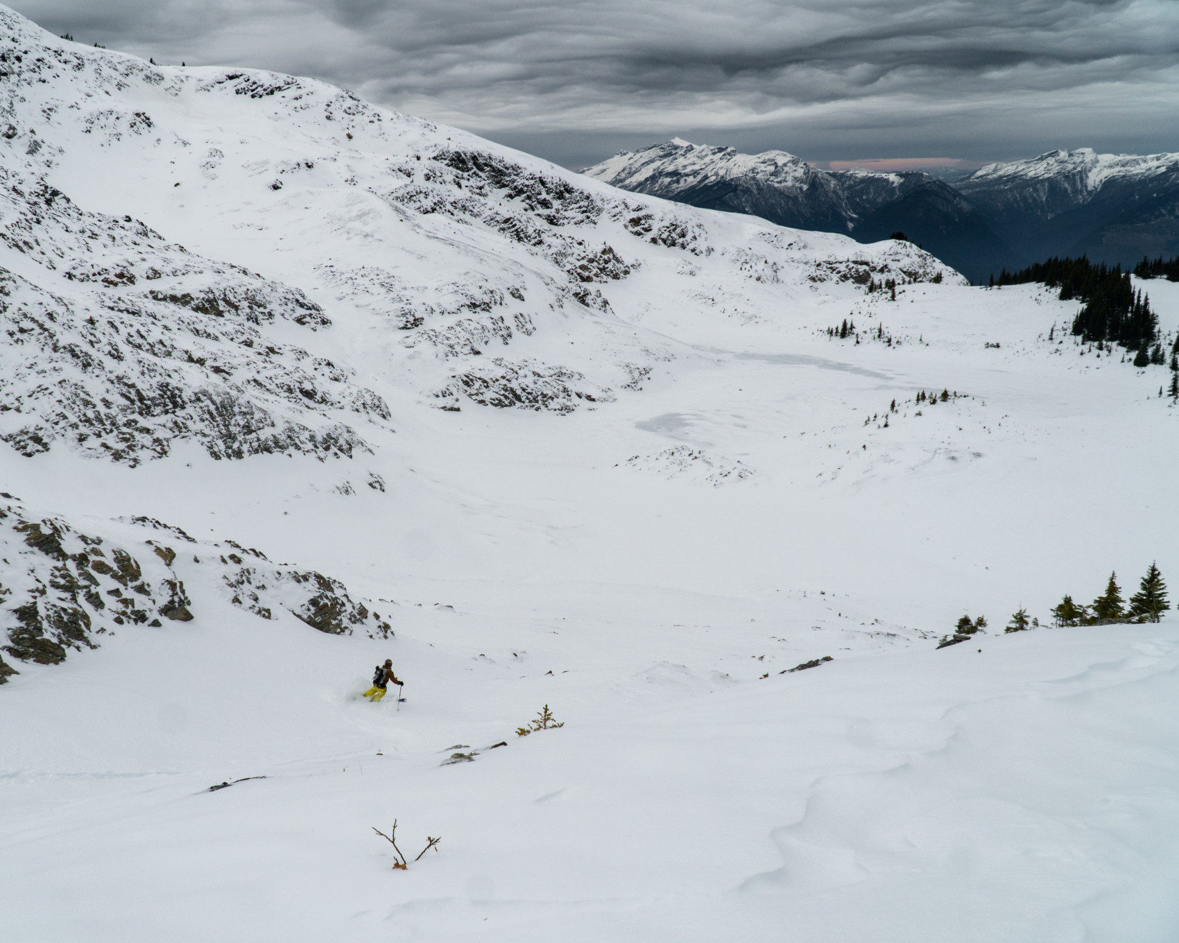 man skiing chutes in the mccrae area