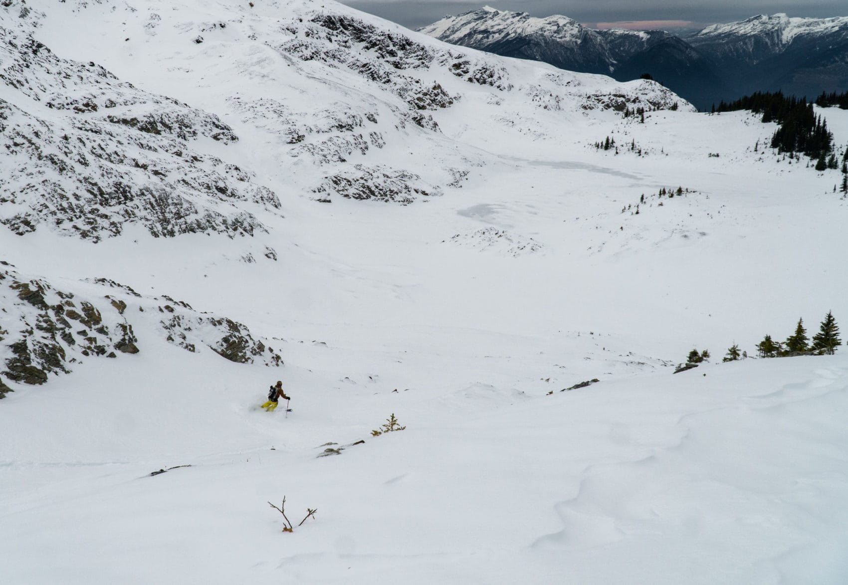 man skiing chutes in the mccrae area