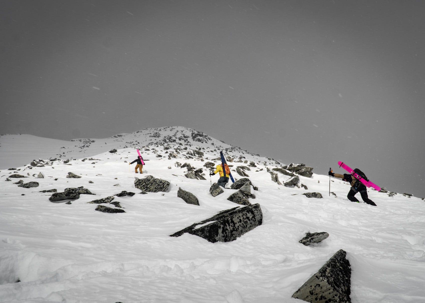 three skiers climbing the grizzly southeast ridge