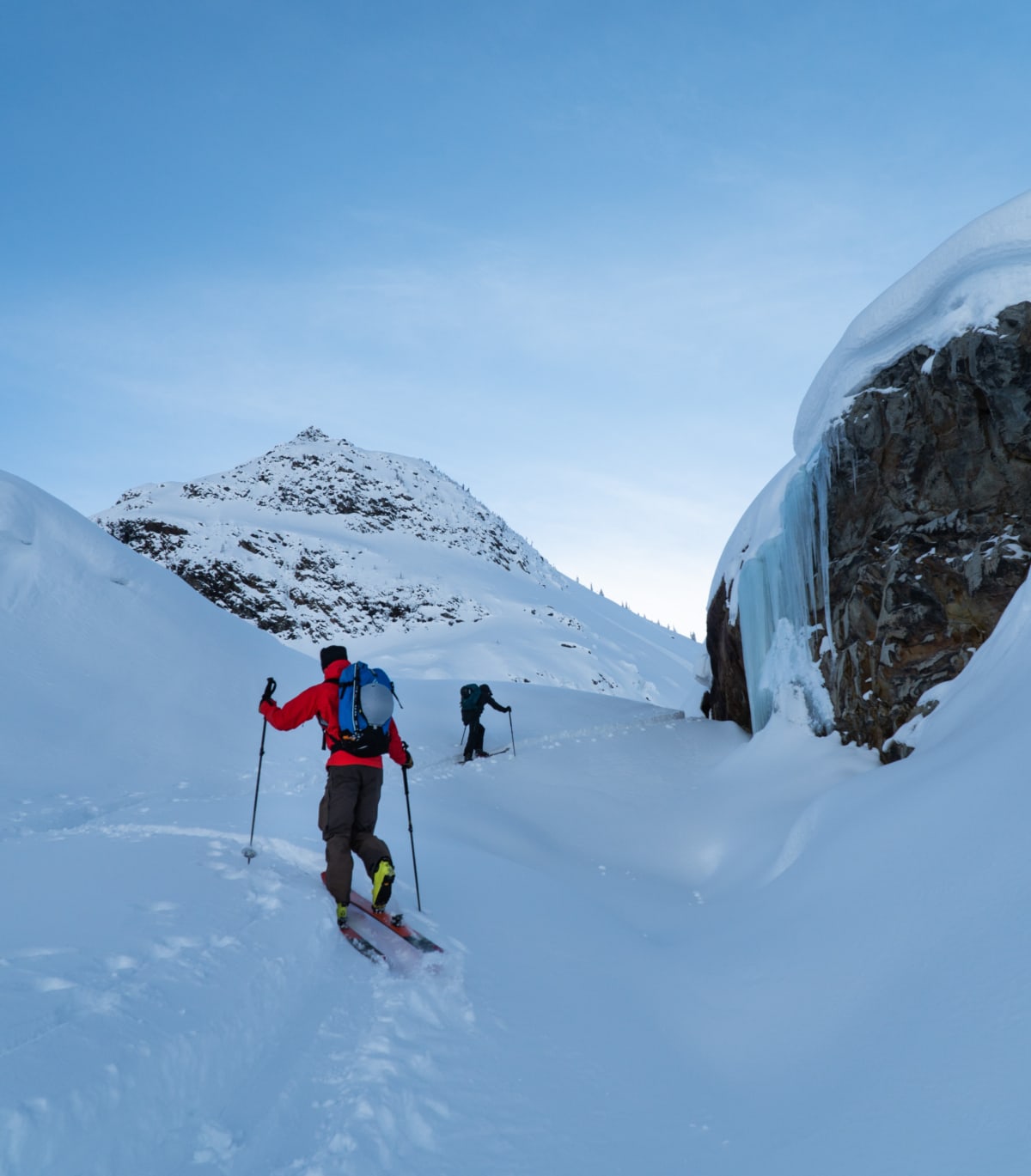 ski tourers heading up the illecillewaet moraine