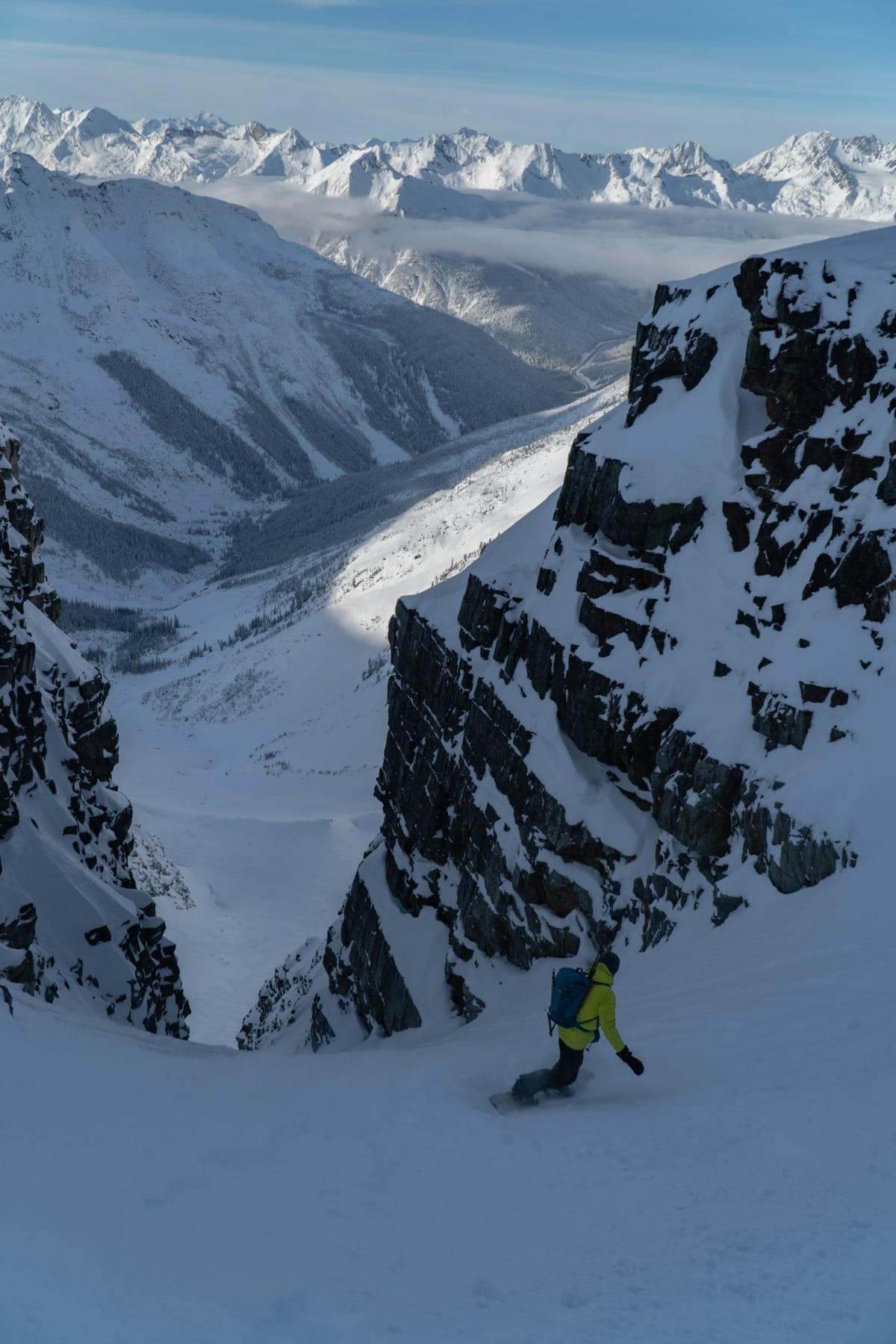 splitboarder making his way down the forever young couloir