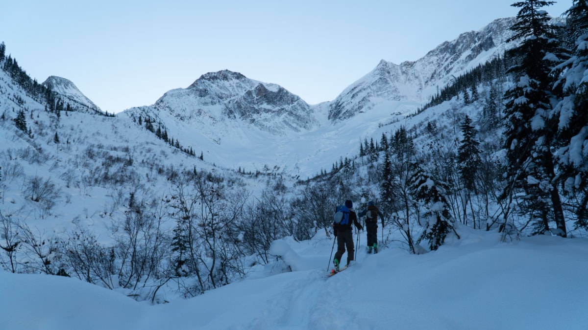 two men skiing up the loop brook drainage