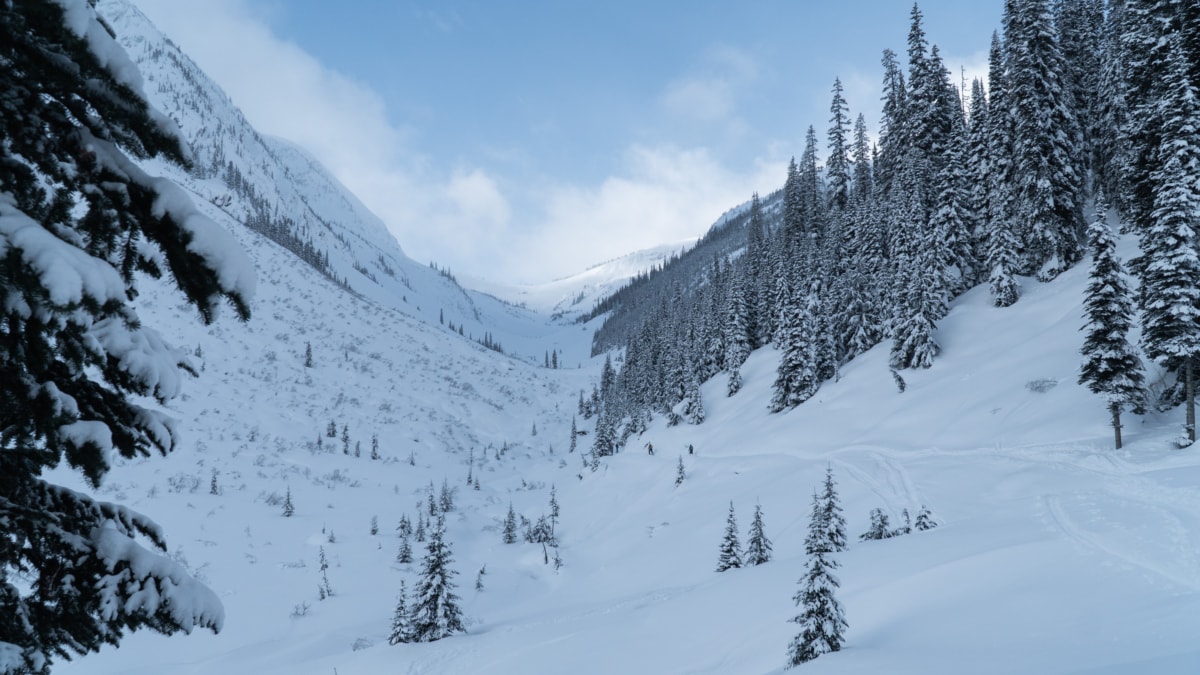 two ski tourers walking up the connaught valley