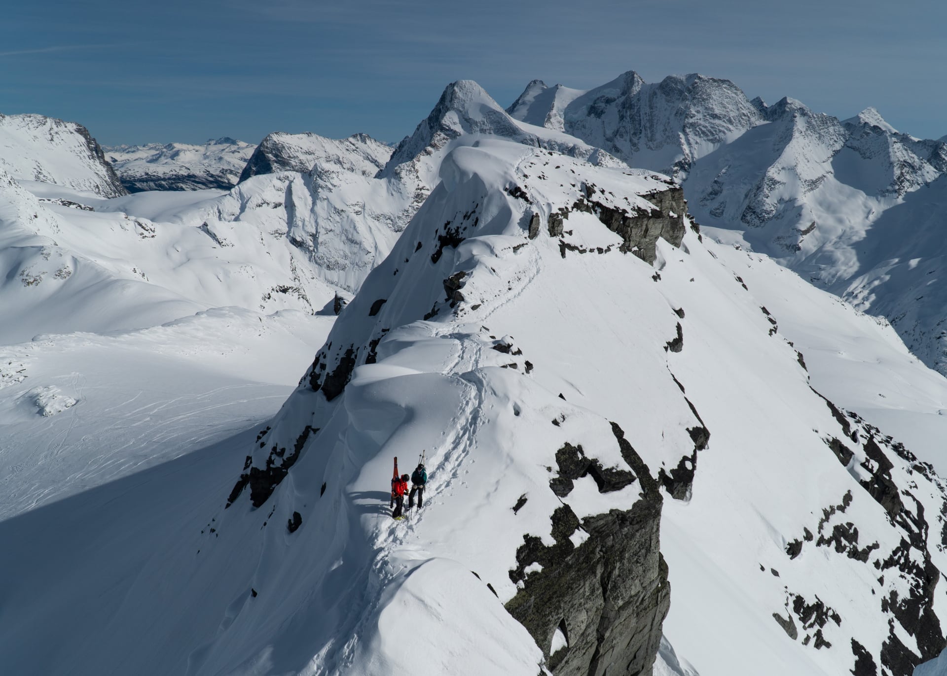 skiers chilling at the base leda peak on the jupiter traverse