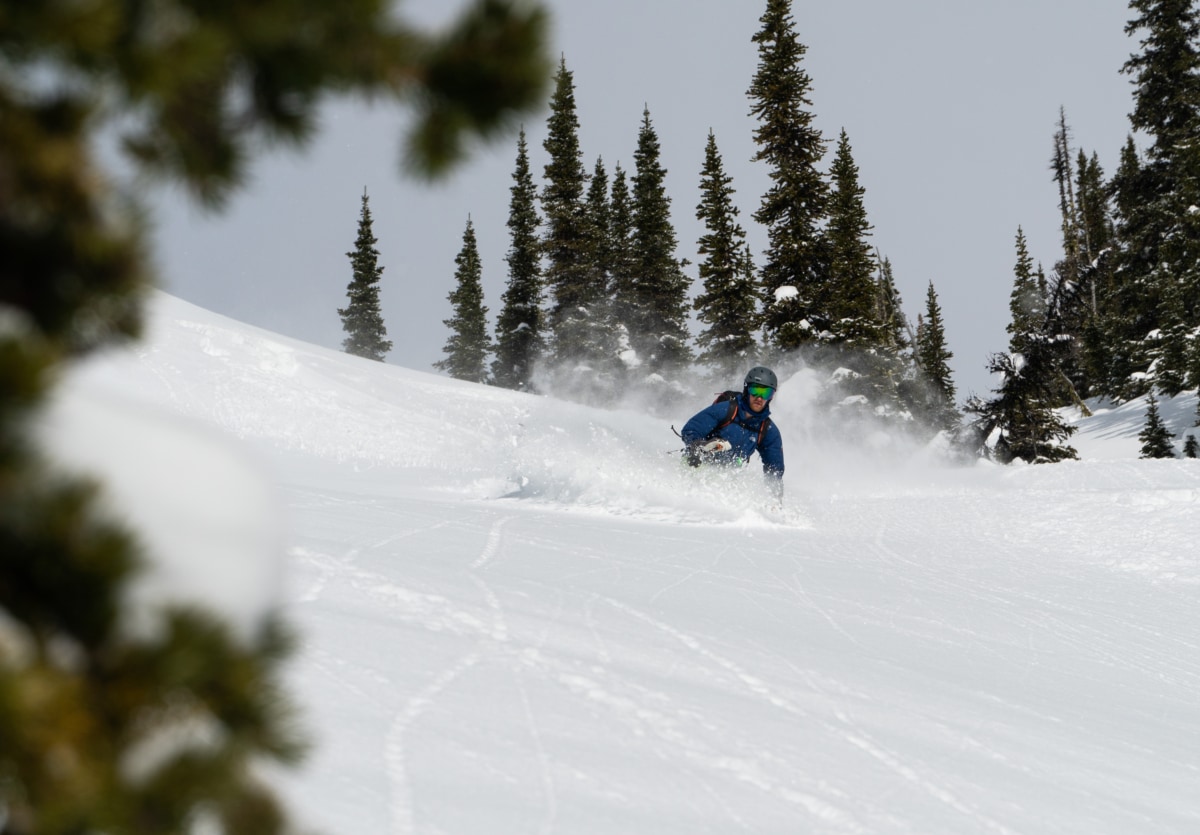 bryn slashing a turn in high density powder