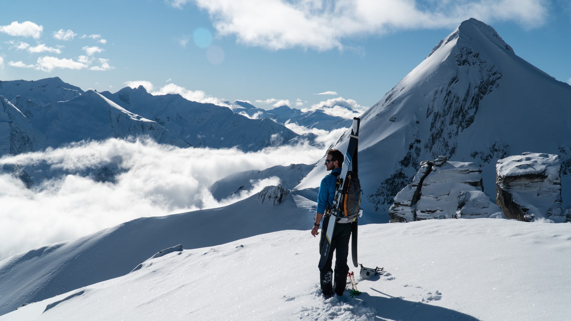 ryan soaking up the sun on top of video peak