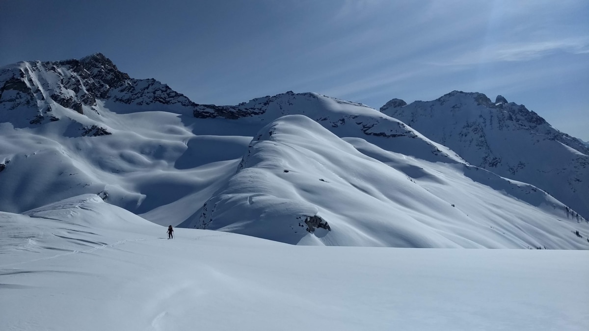 man touring up the juliana glacier