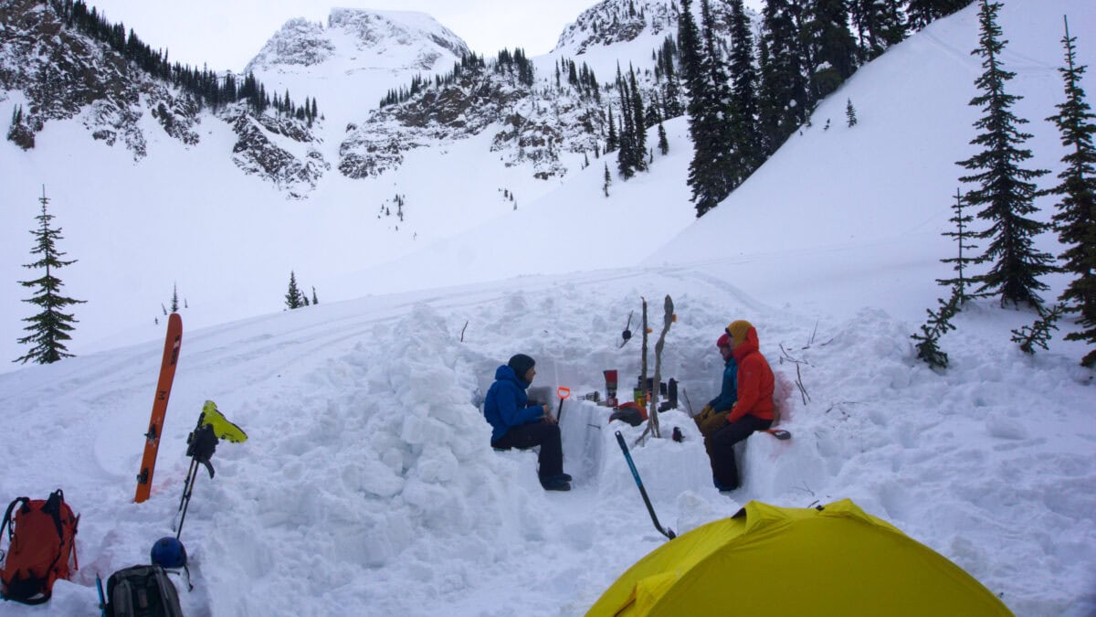 winter camping kitchen setup near ghost lake in the selkirk mountains